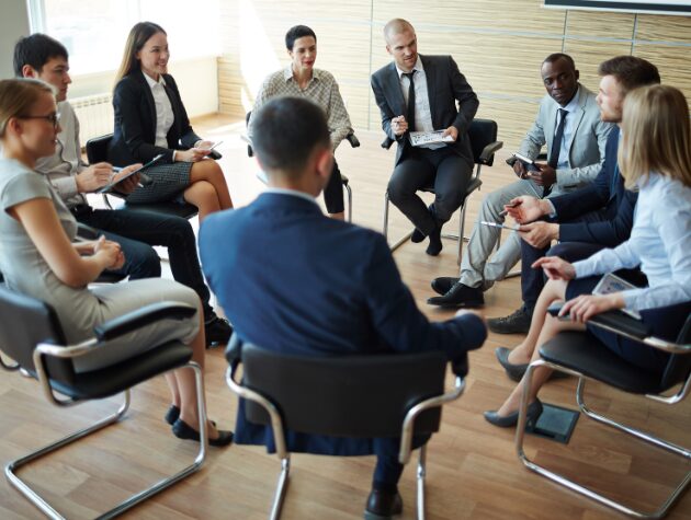 A legal team reviewing case documents together, ensuring compliance with protective order best practices to safeguard confidential information and avoid disputes.